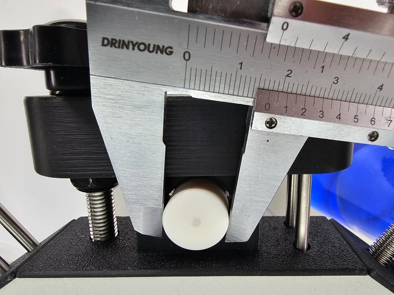 Caliper measuring minimum neck diameter at 17mm