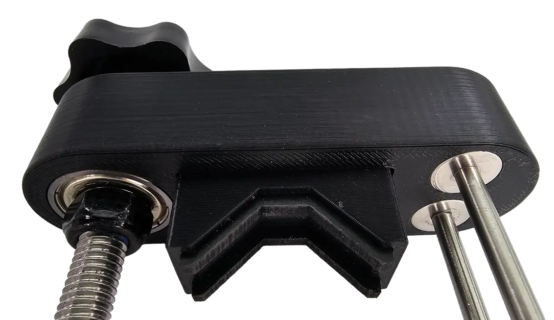 Close-up of universal clamp mechanism showing rod and screw assembly
