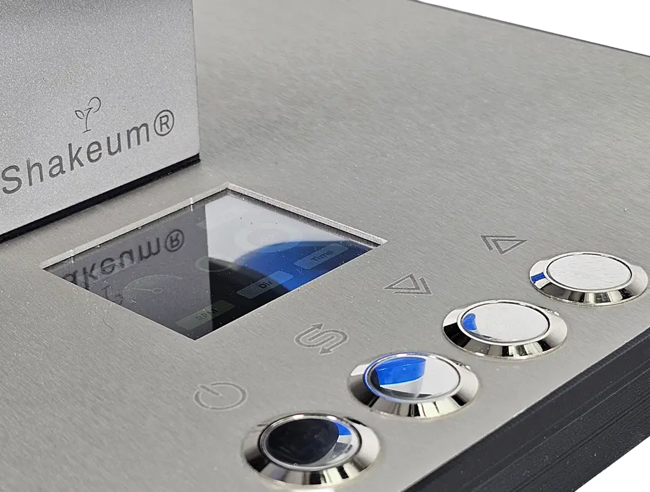 Side view showing Shakeum controls and flasks in motion